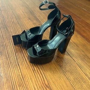 Black platform heels open toe make an offer never worn